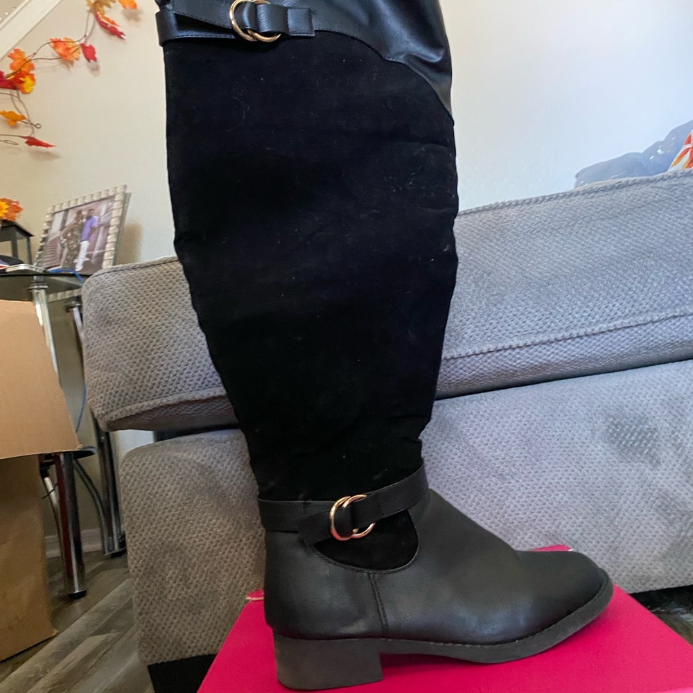 Black rider boots thigh high